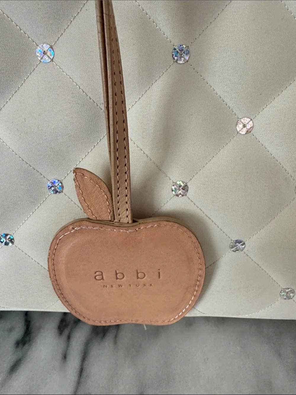 Abbi Cream Quilted Laptop Bag with Crystal Studs and Tan Trim